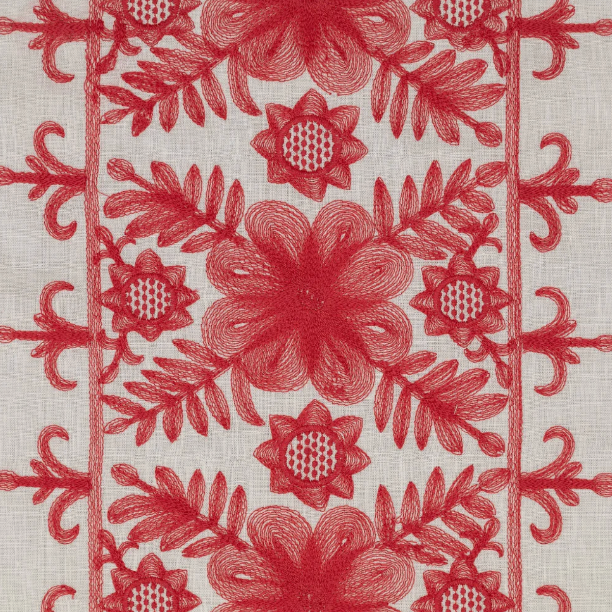 Red floral pattern on a textured white background